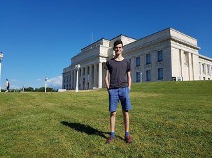 Max Nichol standing outside the Auckland War Memorial Museum